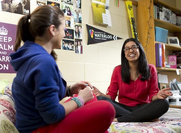 University of Waterloo students share a laugh in residence.