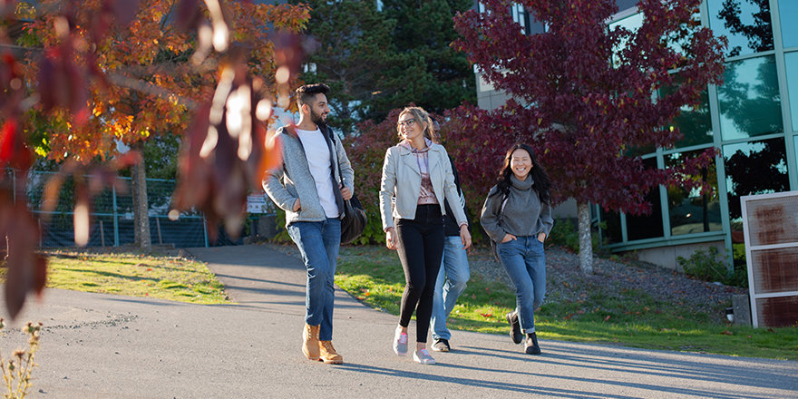 Students enjoy a stroll on the Vancouver Island University campus.