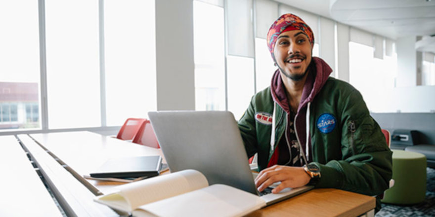 A student at Mount Royal University makes the most of his online education.